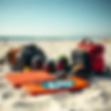 Kiteboarding gear laid out on the sandy beach, ready for adventure