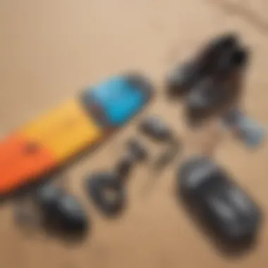 A detailed overview of kiteboarding equipment laid out on a sandy beach