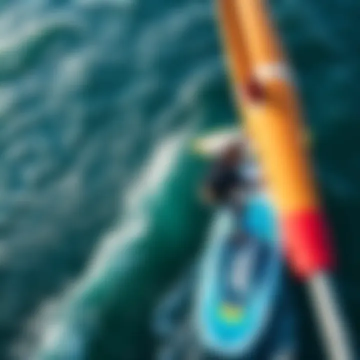 Aerial view of a stand up foil board gliding over water