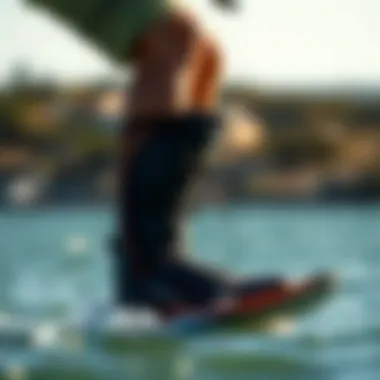 Proper Fit and Comfort in Kite Surfing Boots A kite surfer demonstrating the proper fit and comfort of kite surfing boots while on the water.