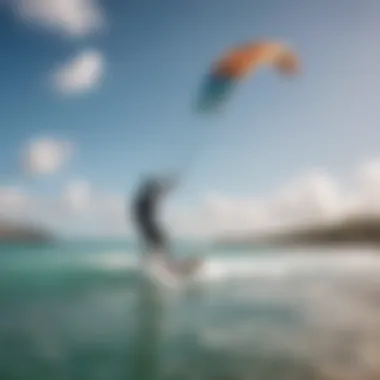 Kiteboarding instructor guiding a student on the beach