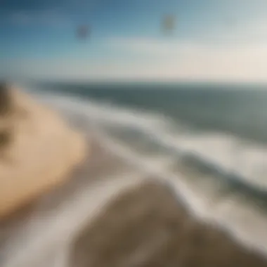 Aerial view of kiteboarders gliding over the waves in Sandbridge, NC