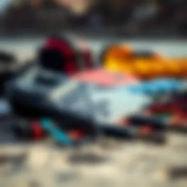 Essential Gear for Kiteboarding Adventures Kiteboarding gear laid out on the beach