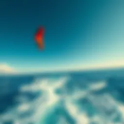 A vibrant kite soaring high above a crystal-clear ocean