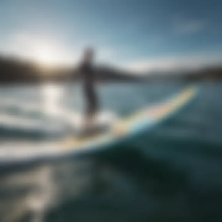 A sleek hydrofoil surfboard gliding above the water surface