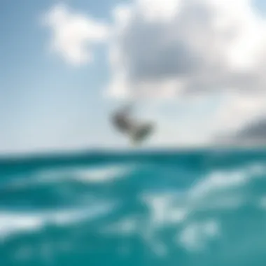 Kitesurfing: Aerial Adventures Kitesurfer soaring high above the ocean waves