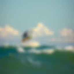 Kiteboarder soaring above the waves at Ponce Inlet