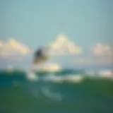 Kiteboarding Adventure at Ponce Inlet Kiteboarder soaring above the waves at Ponce Inlet
