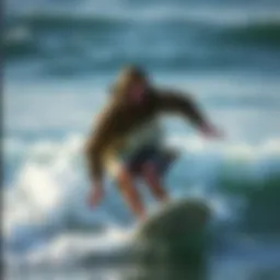 Surfer navigating waves wearing a stylish parka