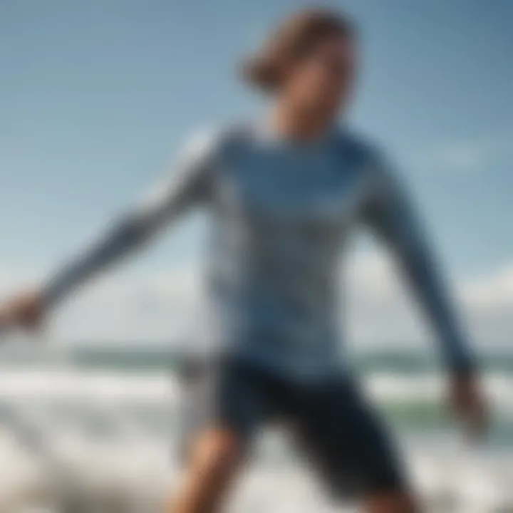 A kiteboarder wearing a long sleeve wet shirt in action on the water