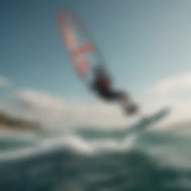 Kiteboarder gliding effortlessly on water, harnessing the power of a foil kite