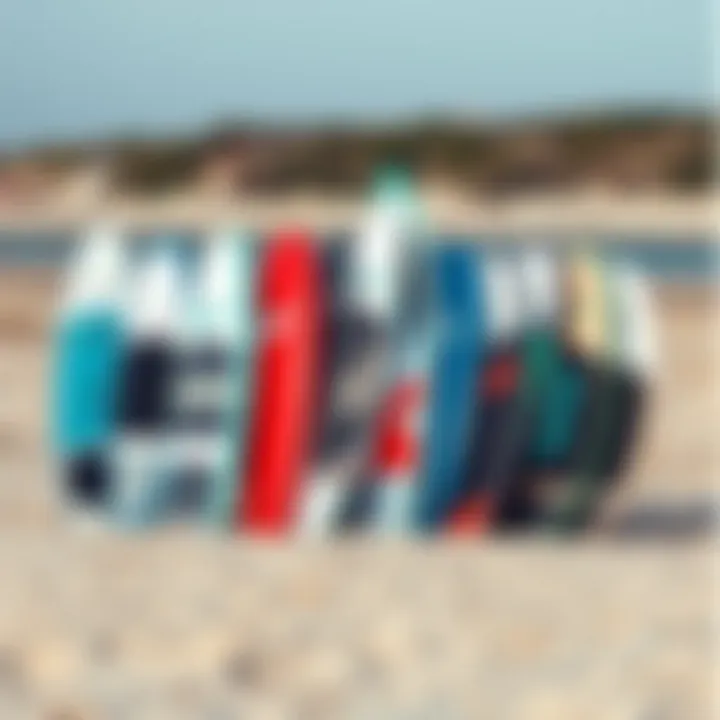 Variety of Wing Surf Foil Boards Diverse range of wing surf foil boards displayed on a sandy beach