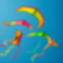 Aerial view of colorful Cali kites flying against a clear blue sky