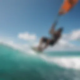 A vibrant kiteboarder gliding over azure waters