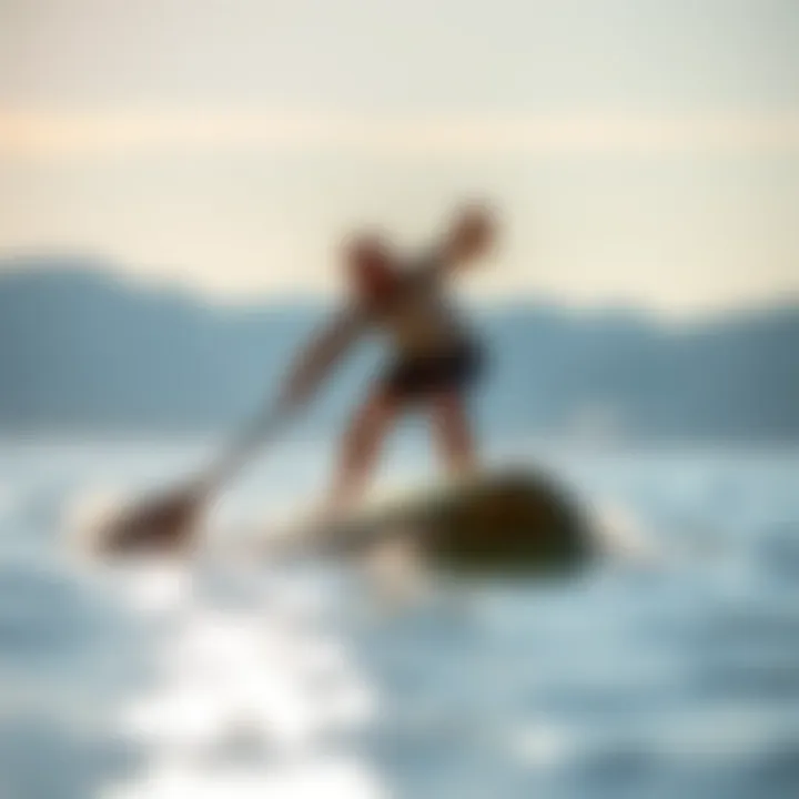 An action shot of a Fanatic SUP in use on a serene water surface