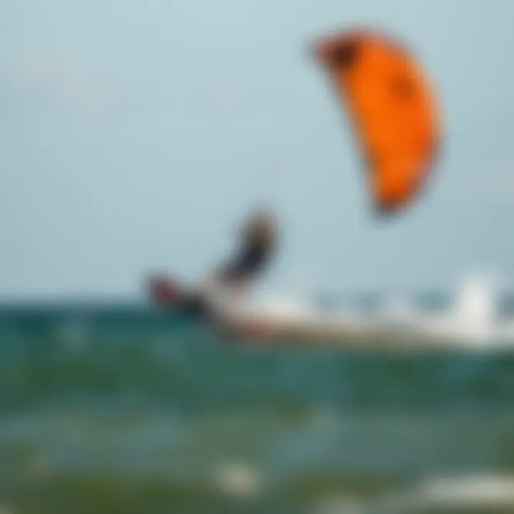 Freeride kiteboarding action over calm waters