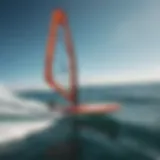 A hydrofoil windsurfing board gliding smoothly over the water