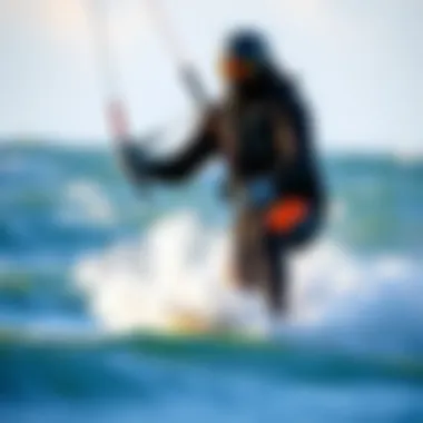 Kiteboarder Navigating Cold Waters Kiteboarder in cold water wearing wetsuit