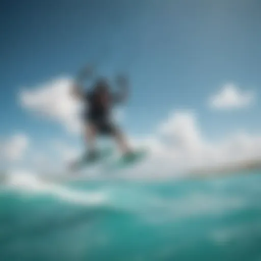 Kiteboarder gliding above turquoise waters of Aruba