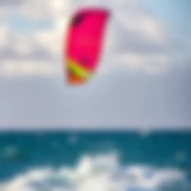 A vibrant kite soaring above the ocean during kiteboarding