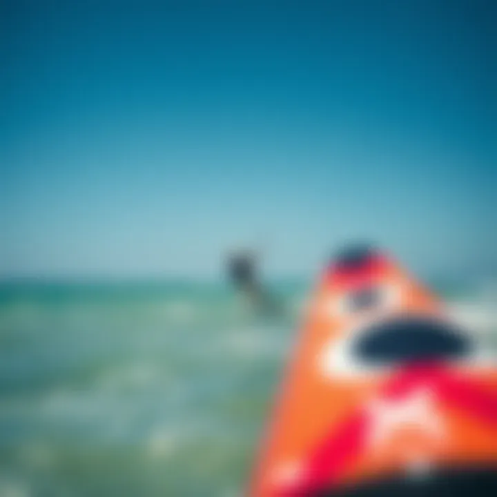 Practicing Kiteboarding Techniques A kiteboarder practicing on water with a training kite, demonstrating proper techniques and safety measures