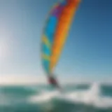 A vibrant kitesurfing kite soaring above the ocean