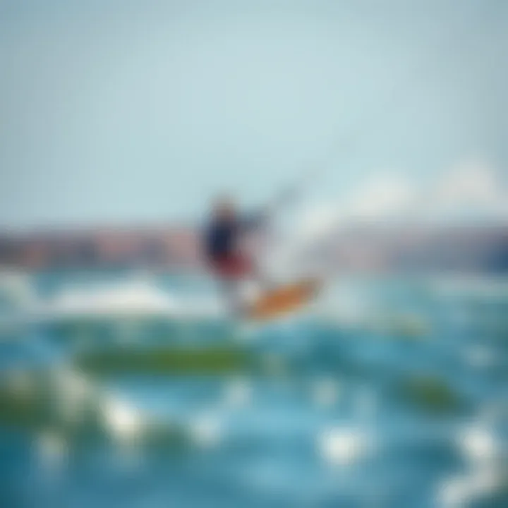 Performance in Action: Naish Foil Board Experience A dynamic shot of a rider effortlessly gliding above the water on a Naish foil board.