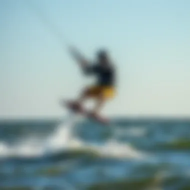 Advanced Pumping Techniques in Kiteboarding Kiteboarder demonstrating advanced pumping techniques on water