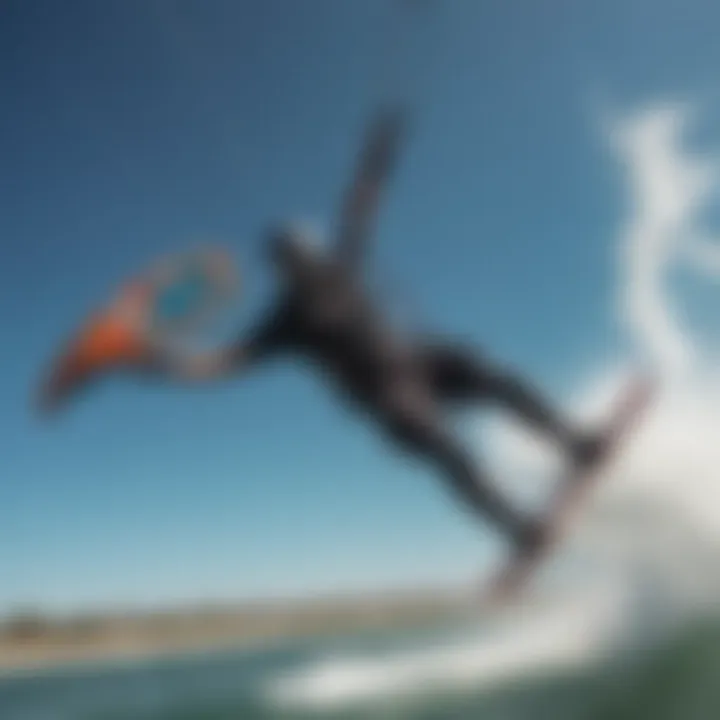 Kiteboarder executing a powerful jump over water