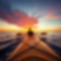 A kayak gliding smoothly across the water with a stunning sunset in the background